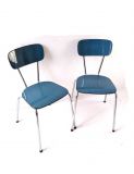 Twee fifties eetkamerstoelen in blauw